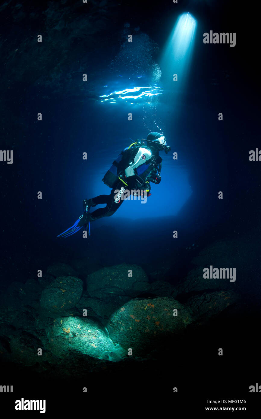 Scuba diver silhouette in the Green cave, Vis Island, Croatia, Adriatic Sea, Mediterranean Stock Photo