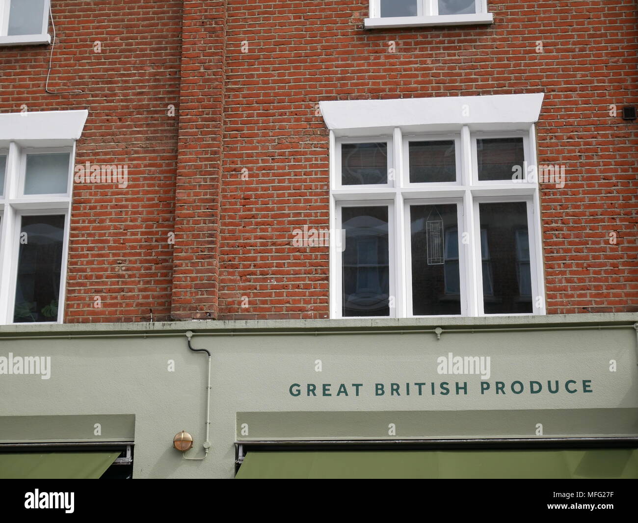 Restaurant sign referencing British produce in London, UK. Stock Photo