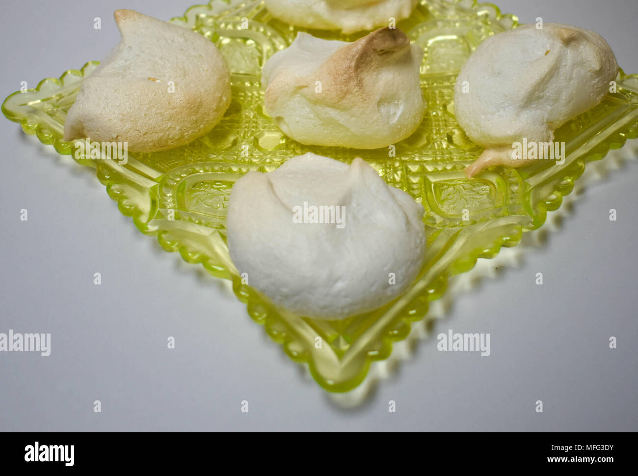 Vaseline Glass Plate with Meringue - Stock Image