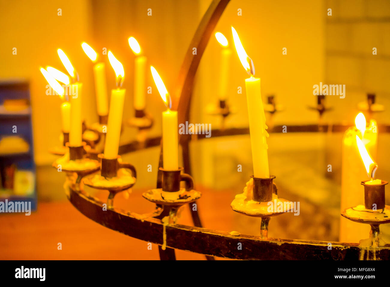 ALESUND, NORWAY - APRIL 04, 2018: Close up of many candles over a metallic  chandelier inside of the Bodo cathedral in Nordland county Stock Photo -  Alamy
