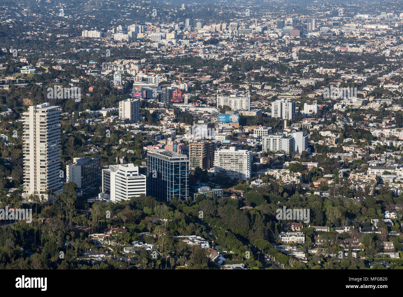 West Hollywood, California, USA - April 18, 2018:  Aerial view of towers and buildings along the Sunset Strip with downtown Hollywood in background. Stock Photo