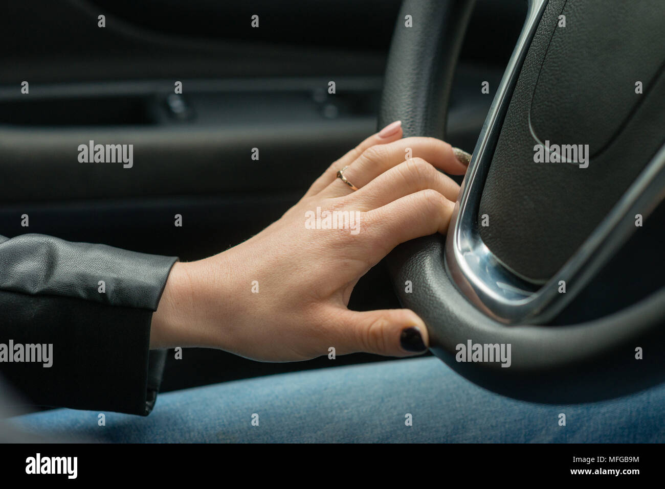 Womans hands on steering wheel hi-res stock photography and images - Alamy
