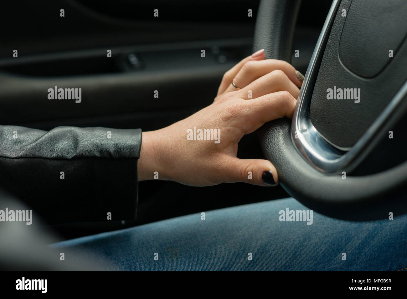 Womans hands on steering wheel hi-res stock photography and images - Alamy