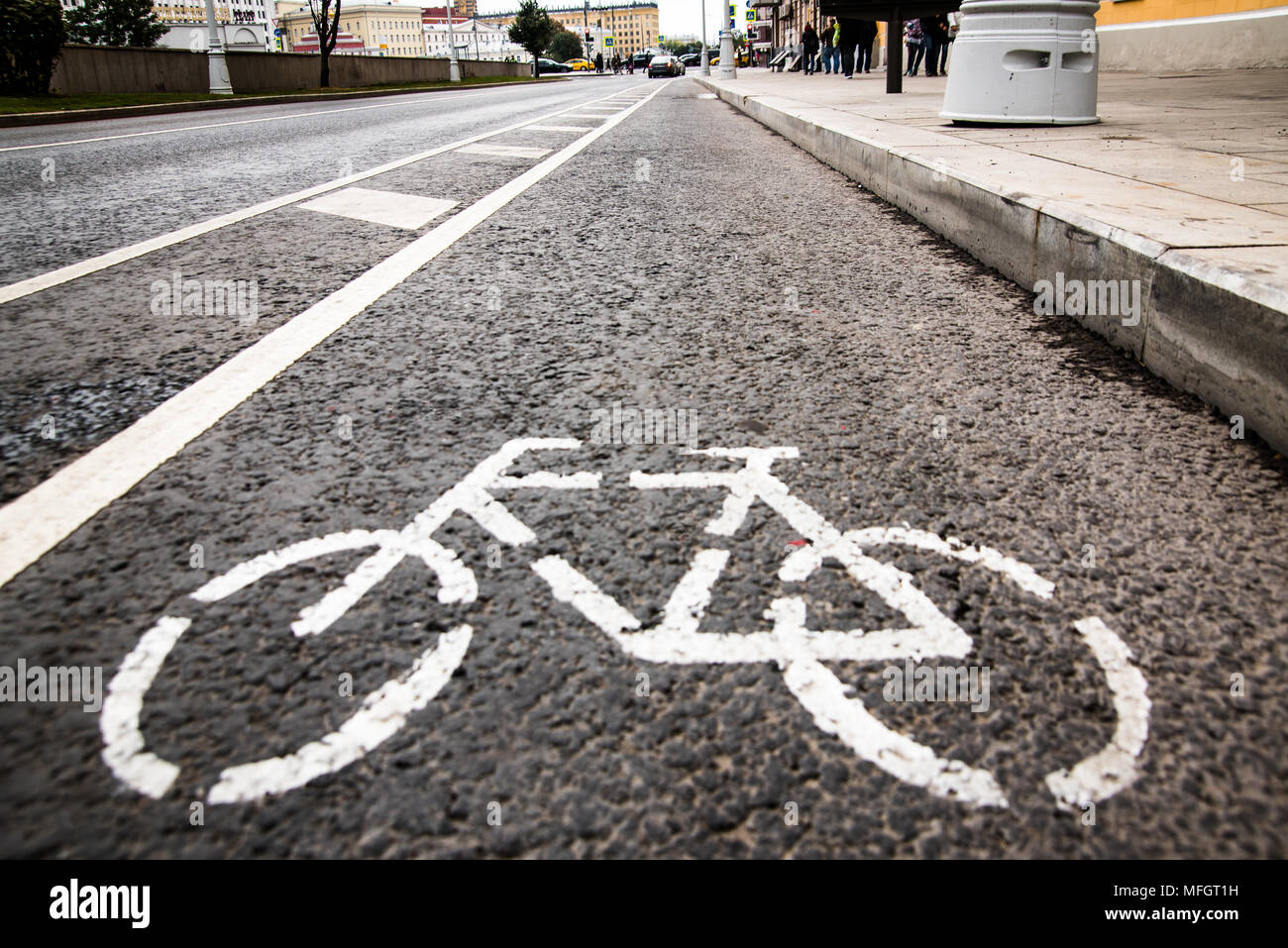 Separate bicycle lane for riding bicycles. White painted bike on ...