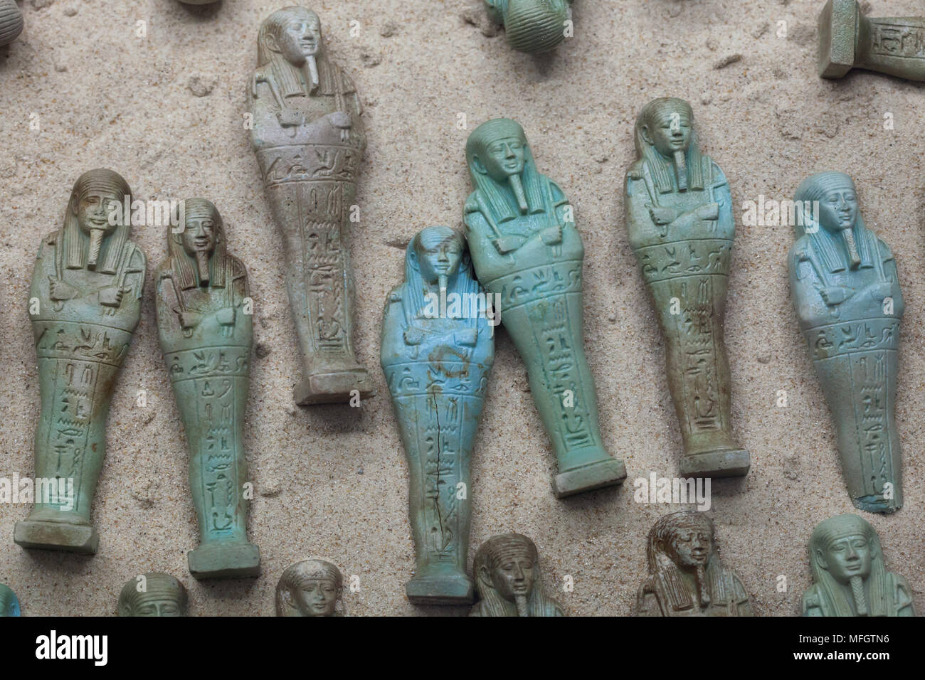 Ancient Egyptian ushabtis (funerary statuettes) of Herugia, born of Asetemhat, dated from the 28th to the 30th Dynasty (404-332 BC) found in Giza on display in the National Archaeological Museum (Museo Archeologico Nazionale di Napoli) in Naples, Campania, Italy. Stock Photo