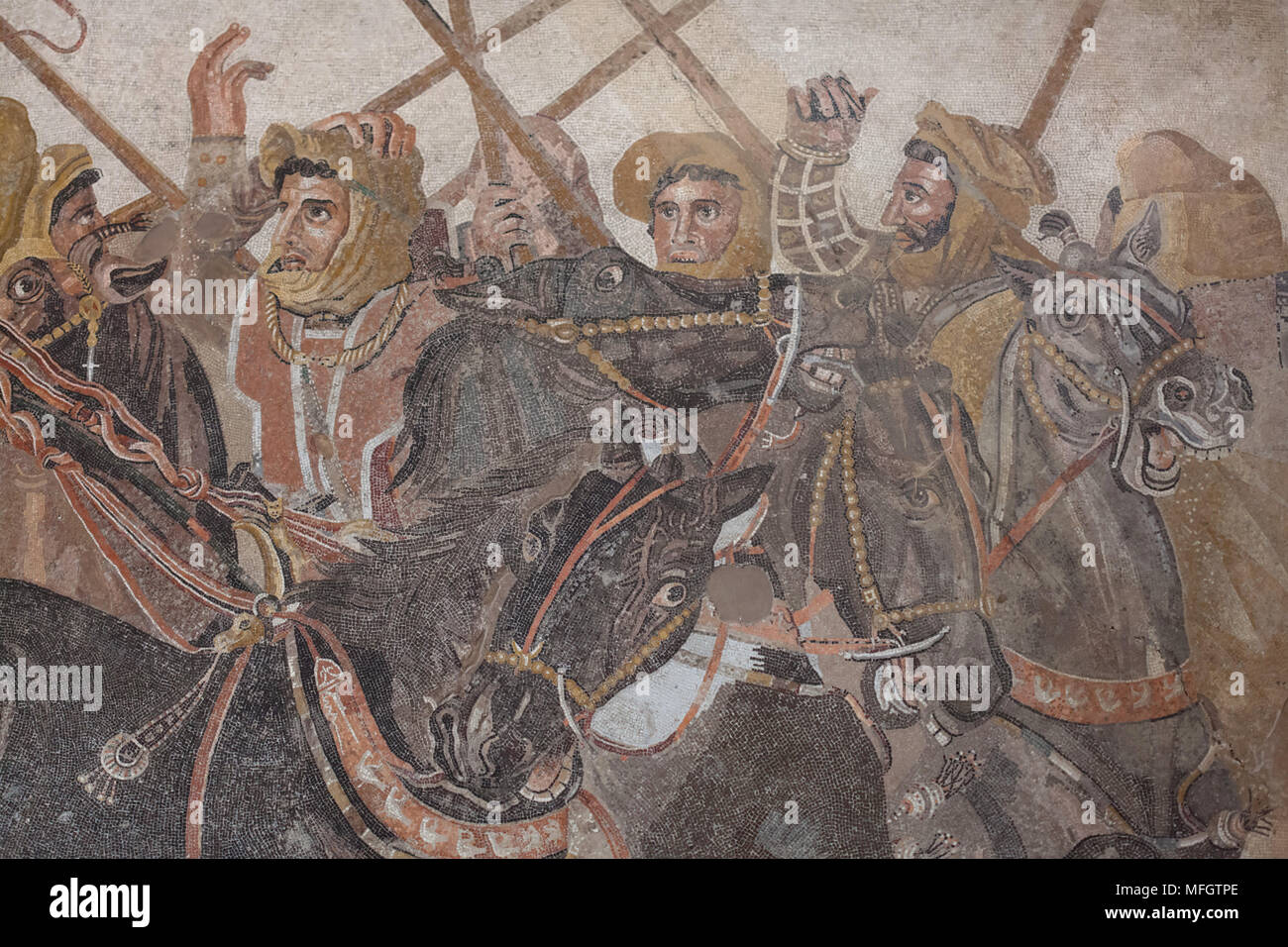 Persian warriors fighting during the battle between Alexander the Great and King Darius depicted in the Alexander Mosaic from the Casa del Fauno (House of the Faun) in Pompeii, now on display in the National Archaeological Museum (Museo Archeologico Nazionale di Napoli) in Naples, Campania, Italy. Alexander the Great is depicted attacking King Darius during one of decisive battles in the conquest of the East, probably the Battle of Issus (333 BC), the Battle of the Granicus River (334 BC) or the Battle of Gaugamela (331 BC). Stock Photo