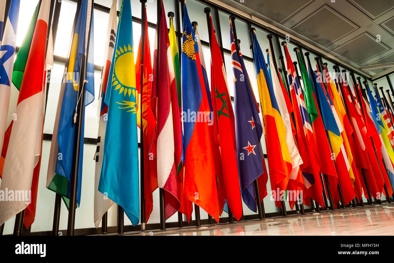 Many world countries flags are seen in a row. Stock Photo