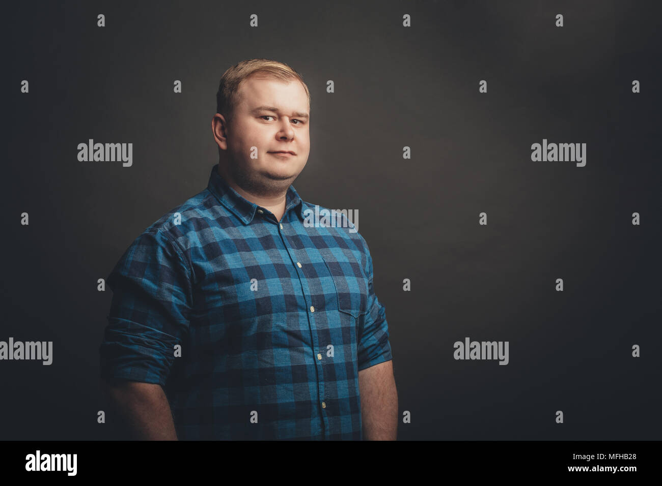 confident caucasian fat man looking at camera Stock Photo