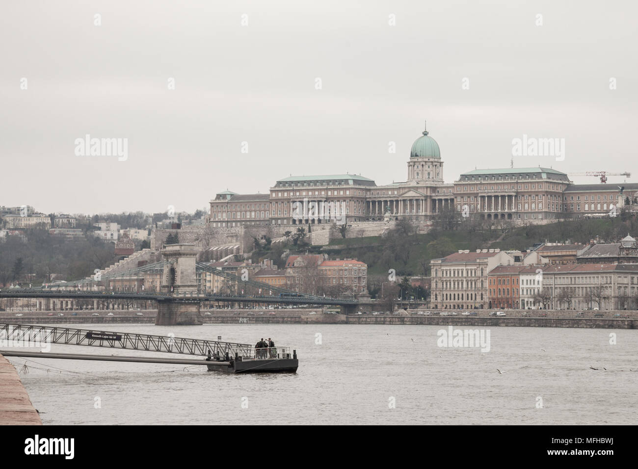 BUDAPEST, HUNGARY - APRIL 7, 2018: Buda Castle seen from Pest with the Danube in front.  The cast is the historical palace complex of the Hungarian ki Stock Photo