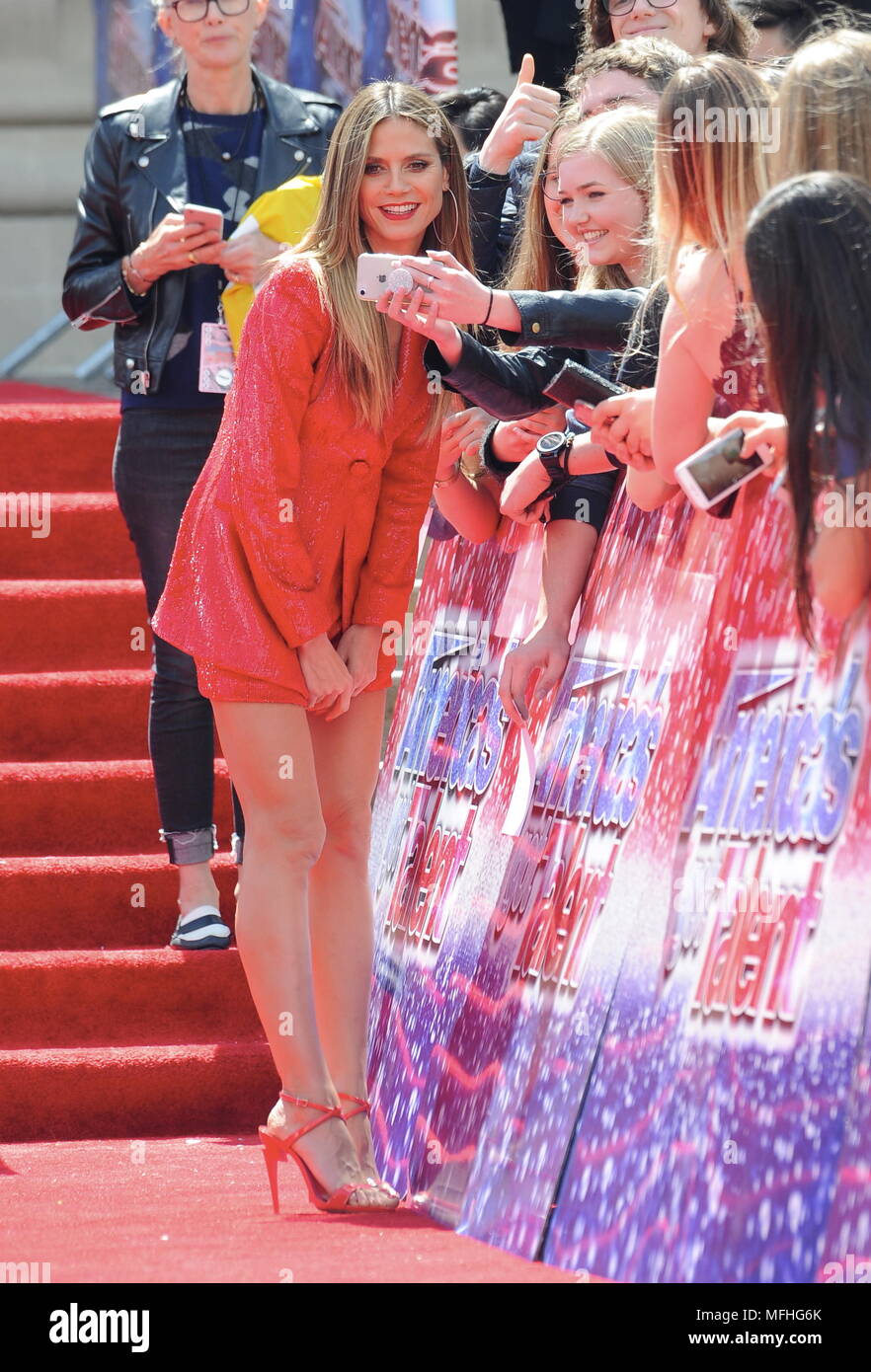 Heidi Klum hits the red carpet in a red tight dress for "Americas Got ...