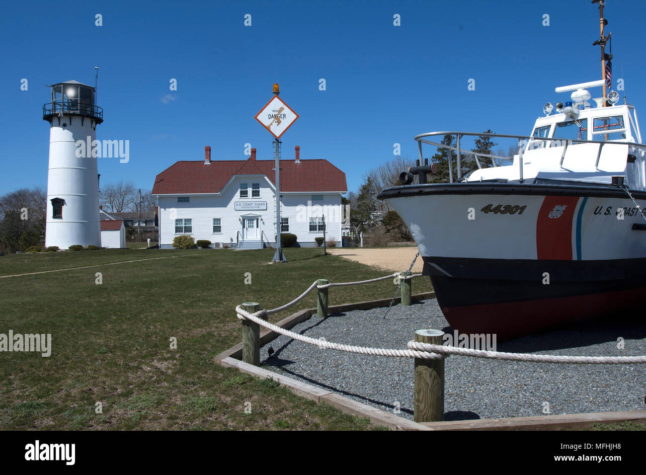 Chatham Light and US Coast Guard boat on display on Cape Cod, Massachusetts, USA Stock Photo