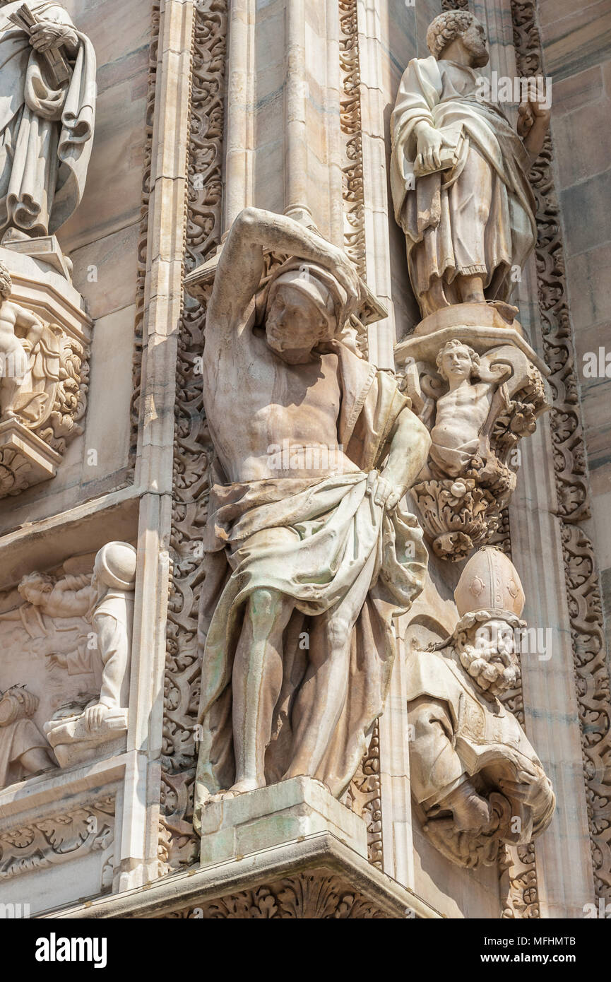 Sculptures on the Milan Cathedral (Duomo di Milano), the largest cathedral  in Italy Stock Photo - Alamy