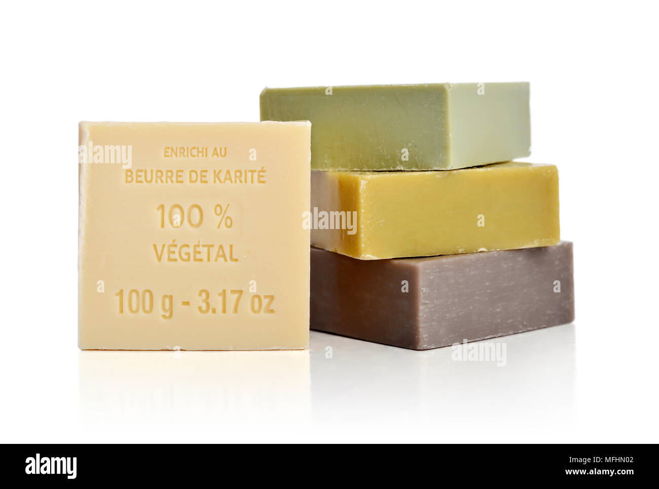 Enriched with Shea Butter 100% vegetal soaps isolated on white background Stock Photo