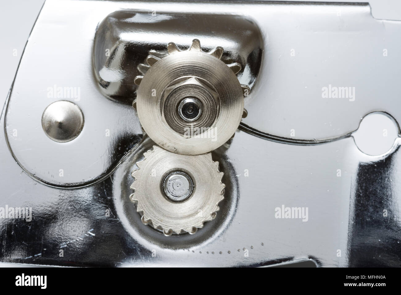 Closeup of gear wheel and cutter on a lowcost manual can opener Stock