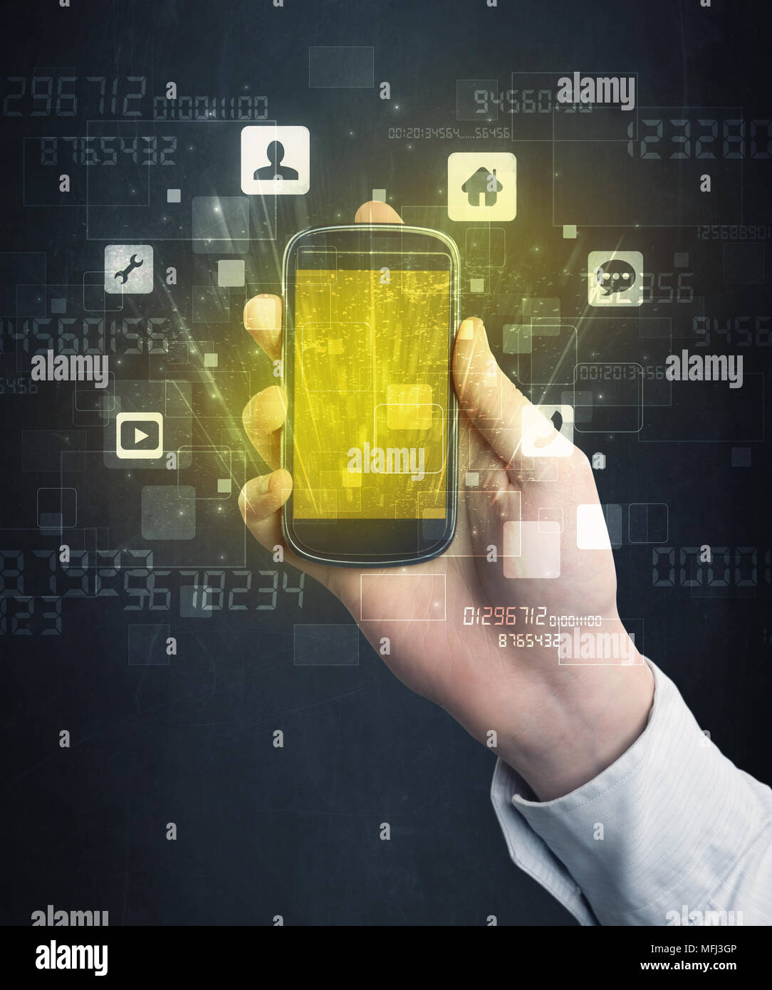 Caucasian hand in business suit holding a smartphone with golden-yellow ...