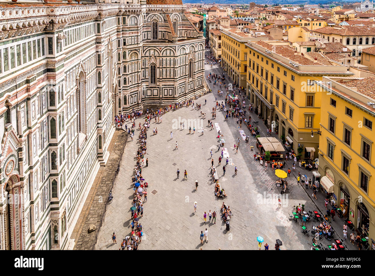 Huge crowds line up to enter bell tower in the Florence Cathedral, more commonly known as the Duomo di Firenze. Stock Photo