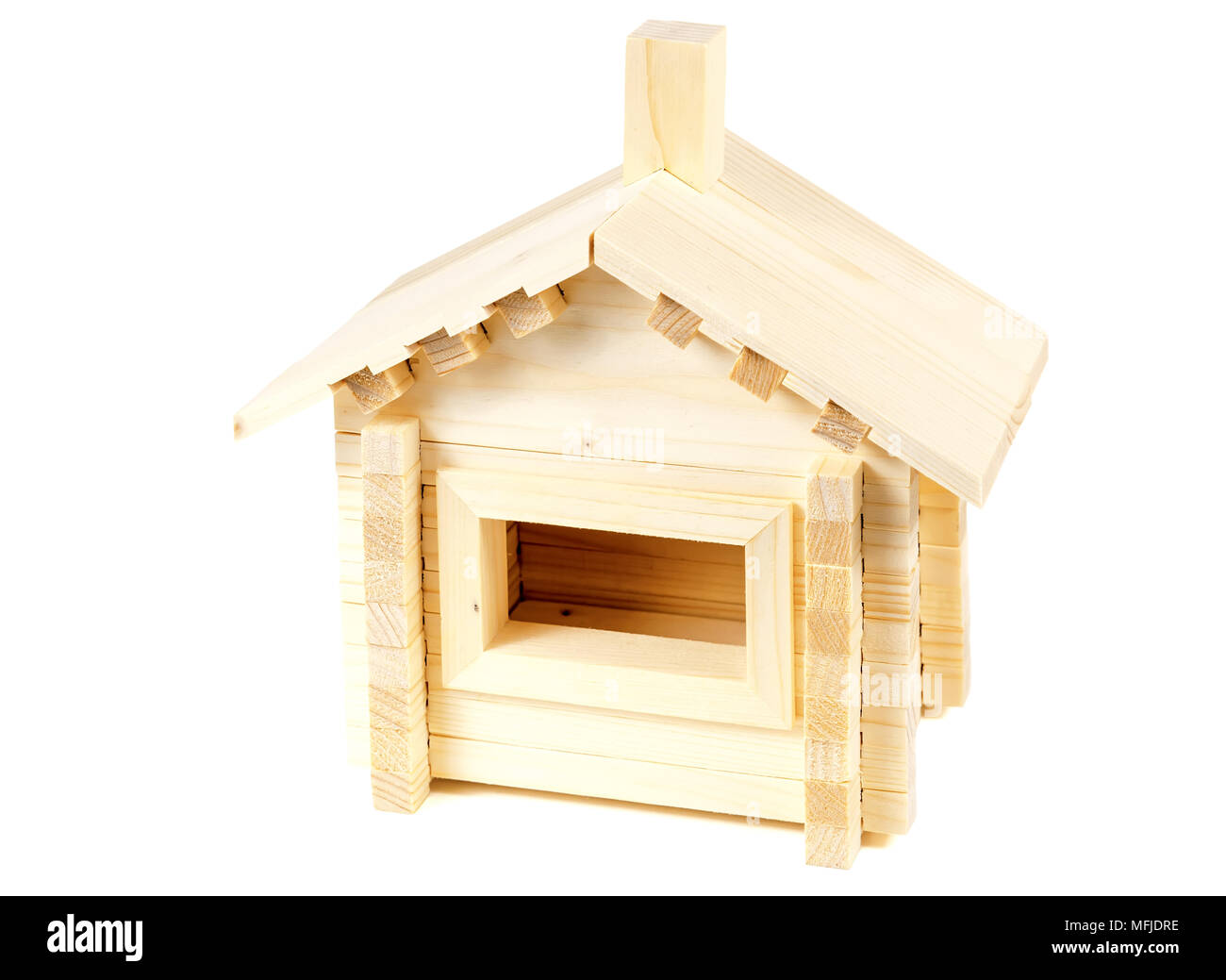 Little weekend house with natural colored toy on white background Stock Photo