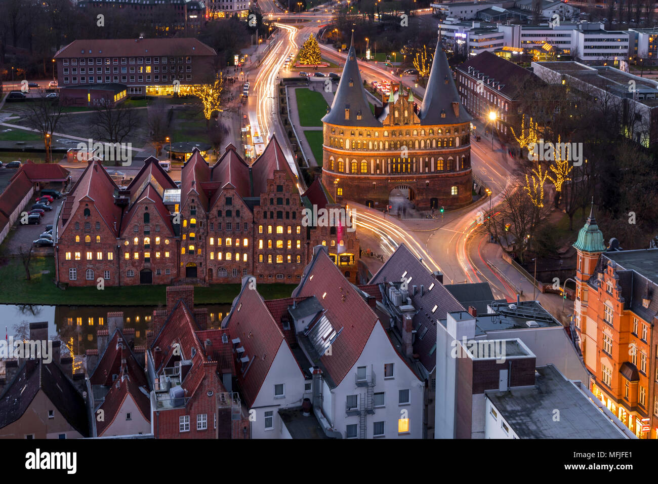 Elevated view from the St. Petri Church over the Holsten Gate in Lubeck at dusk, Lubeck, Schleswig-Holstein, Germany, Europe Stock Photo