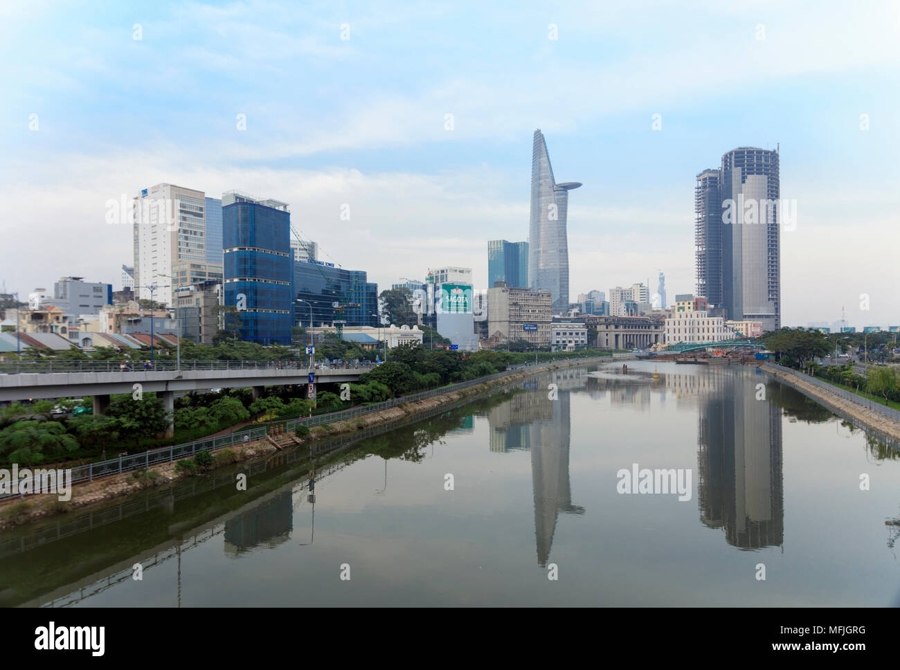 The view of the Bitexco Tower in Ho Chi Minh City (Saigon) centre and a canal off the Saigon River, Vietnam, Indochina, Southeast Asia, Asia Stock Photo