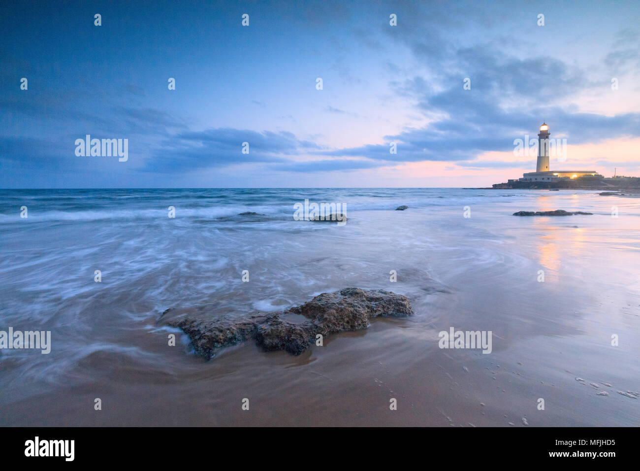 Lighthouse at dusk, Capo Granitola, Campobello di Mazara, province of Trapani, Sicily, Italy, Mediterranean, Europe Stock Photo