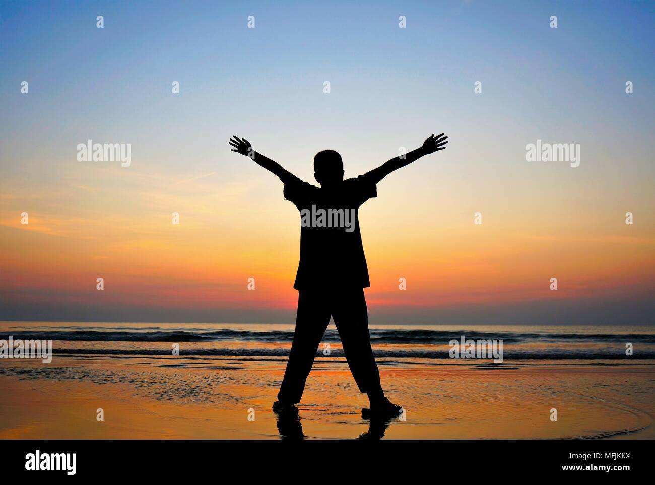 Silhouette Of A Man With His Arms Stretched Out To The Sun. Stock Photo,  Picture and Royalty Free Image. Image 4104588.