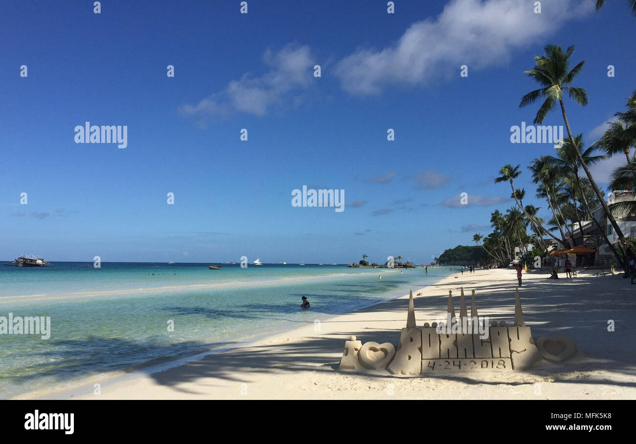 24 April 2018, Philippines, Boracay Island: The four km long white beach. A few weeks ago the island was still a dream goal. For some, the island was the most beautiful in the world. That is until the president of the Philippines called it a cesspit. At least the island is fully booked for the next six months. Photo: Girlie Linao/dpa Stock Photo