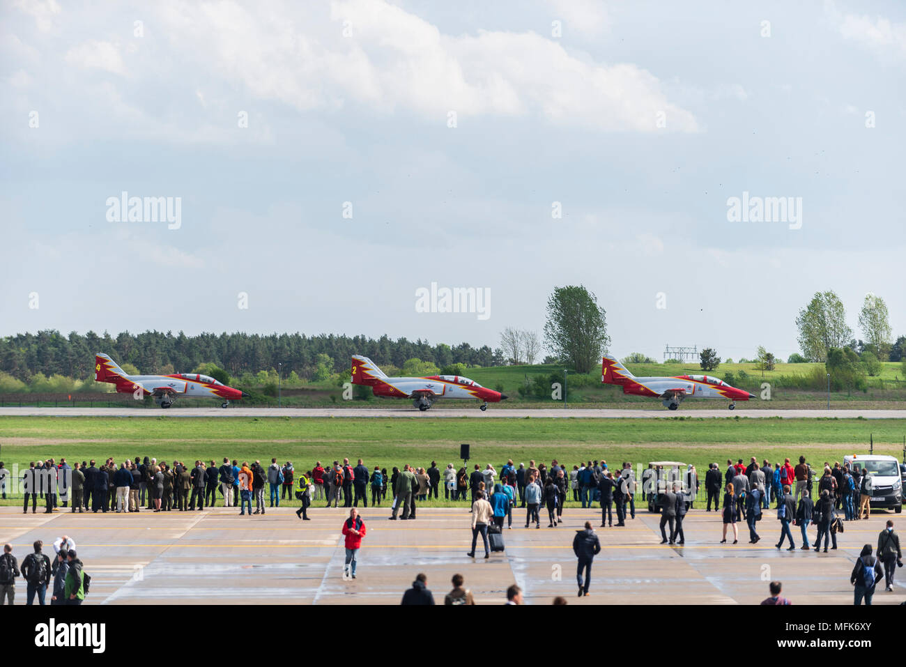 Berlin, Germany. 25th Apr, 2018. The aerobatic squadron of the Spanish Air Force Patrulla Aguila about to flies an air show during the first day of the International Air and Space Exhibition at Schoenefeld Airport. Over 150,000 visitors will visit the Civil and Military Aerospace Fair. Credit: Markus Heine/SOPA Images/ZUMA Wire/Alamy Live News Stock Photo