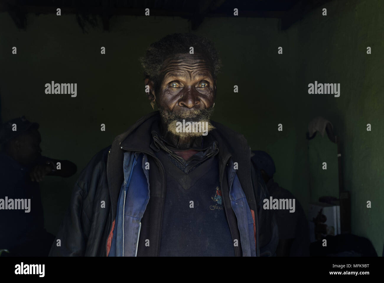 December 8, 2017 - Matatiele, Eastern Cape, South Africa - Malign, 87, attends an initiation ceremony. He worked his entire life underground, digging for gold in the mines of Johannesburg. Today, he needs care and help from the community to manage the daily routines. (Credit Image: © Stefan Kleinowitz via ZUMA Wire) Stock Photo