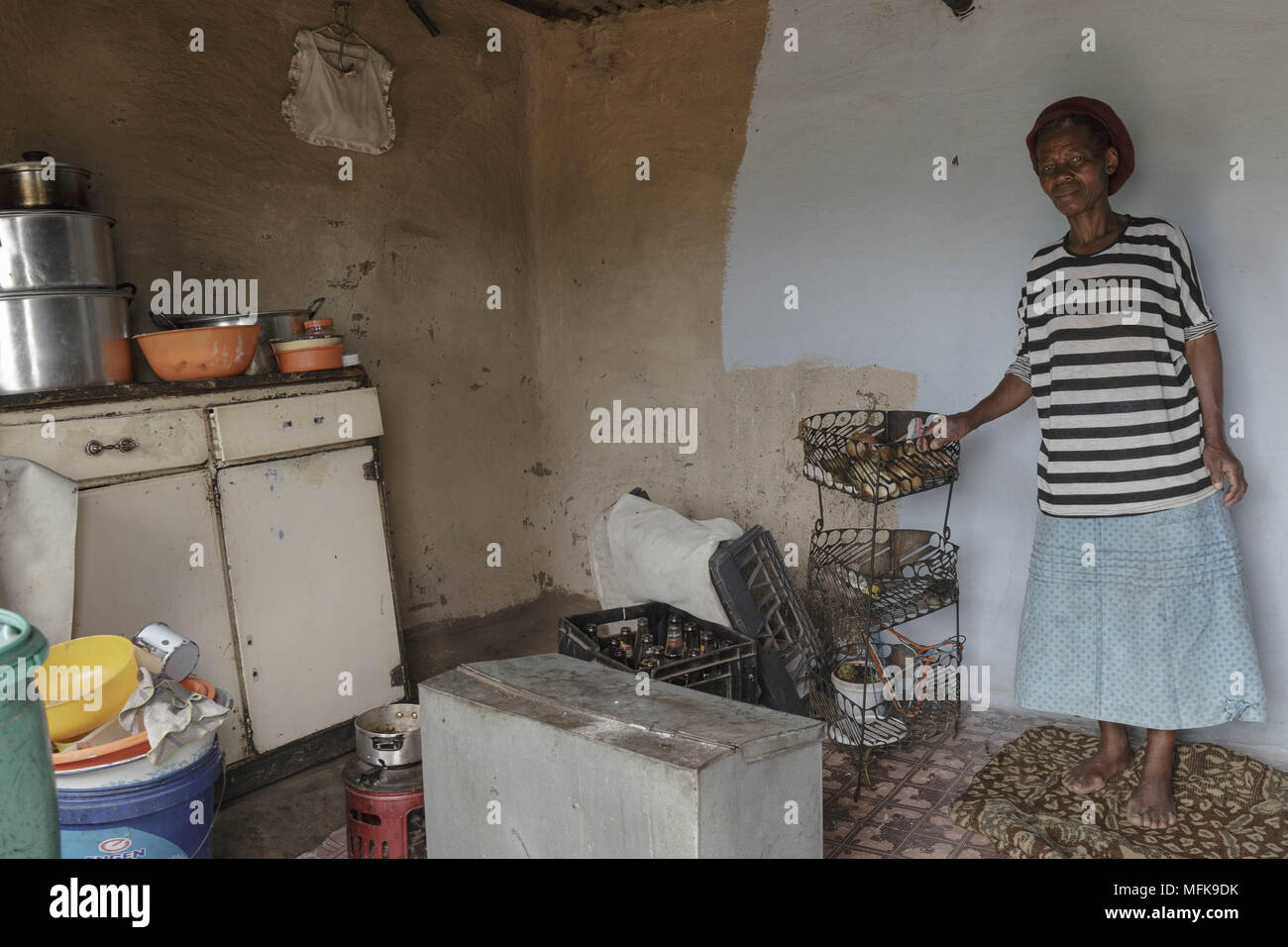 January 13, 2018 - Matatiele, Eastern Cape, South Africa - Martha, 67, stands in the kitchen of her small mud house. (Credit Image: © Stefan Kleinowitz via ZUMA Wire) Stock Photo
