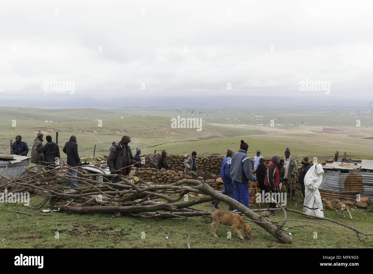 December 5, 2017 - Matatiele, Eastern Cape, South Africa - An initiate walks to his hut where he will spend 4 weeks on his own. His family and friends accompany him to the hut, where only Xhosa men are allowed to get close to during the ceremony. (Credit Image: © Stefan Kleinowitz via ZUMA Wire) Stock Photo