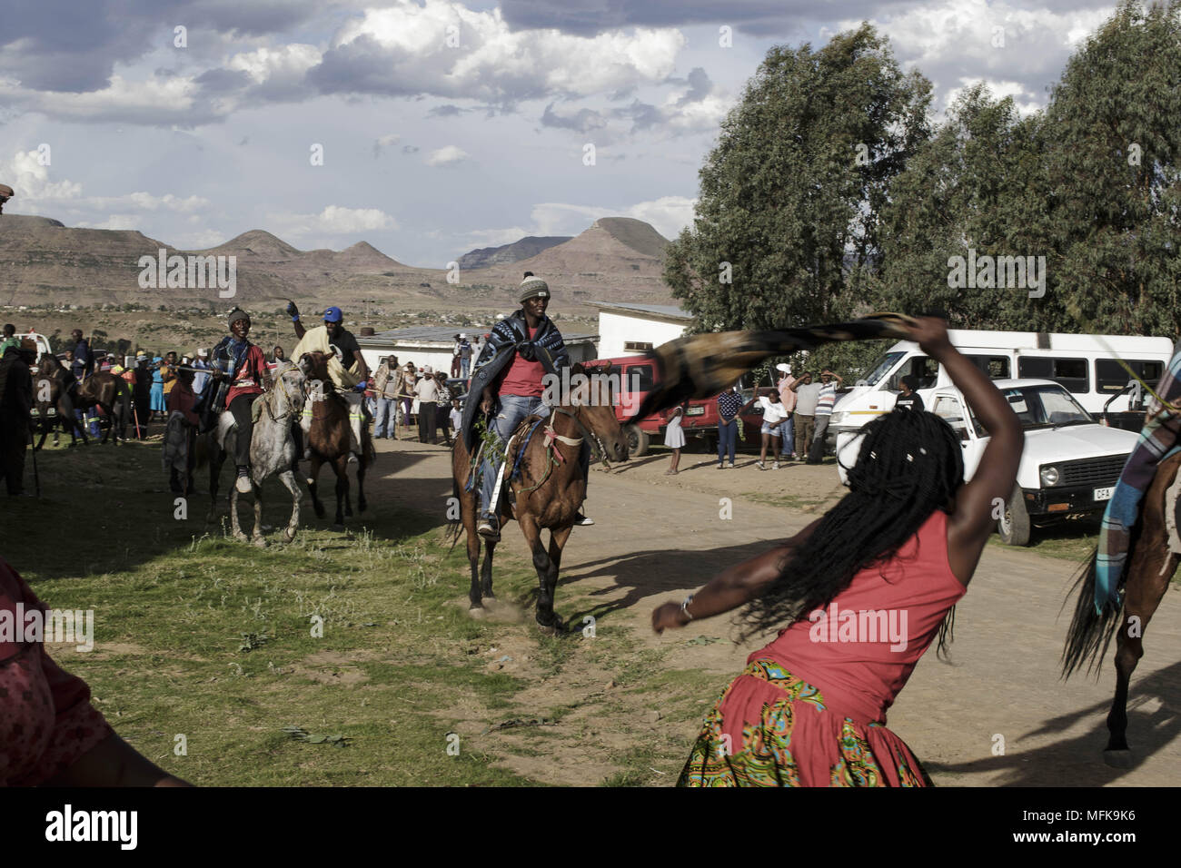 December 29, 2017 - Matatiele, Eastern Cape, South Africa - Xhosa people wait for the initiates to return from the mountains. Women and horse riders hit each other with sticks and textiles. (Credit Image: © Stefan Kleinowitz via ZUMA Wire) Stock Photo