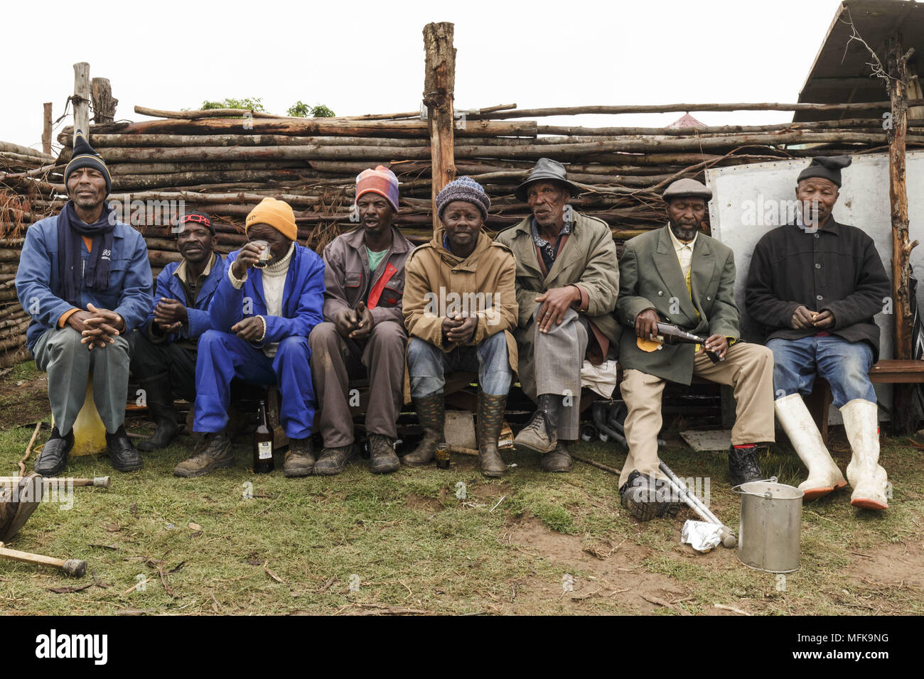 December 4, 2017 - Matatiele, Eastern Cape, South Africa - Xhosa men attend an initiation ceremony, sit together and drink a lot of beer. (Credit Image: © Stefan Kleinowitz via ZUMA Wire) Stock Photo