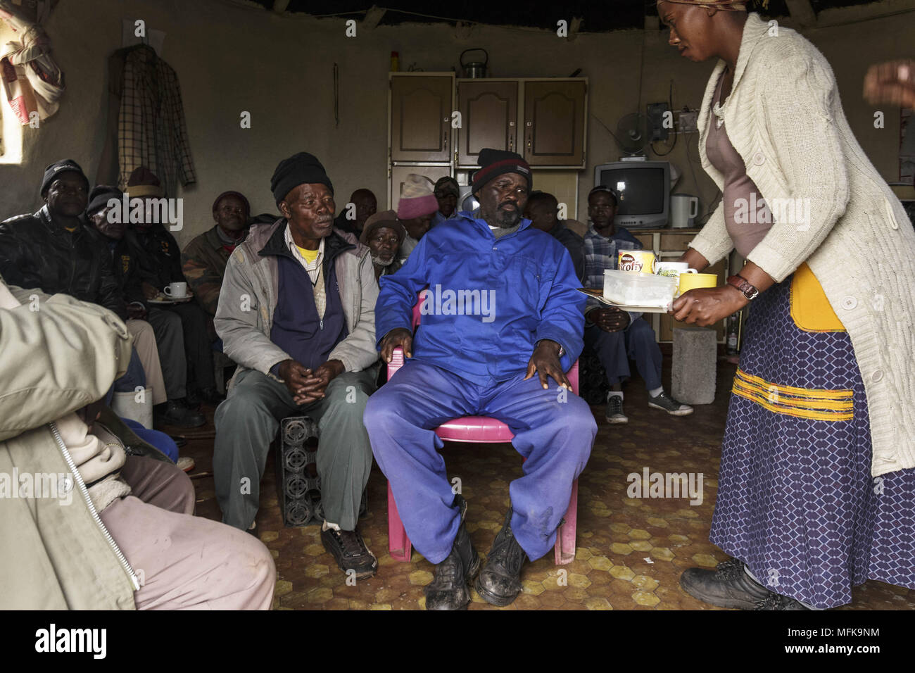 Matatiele, Eastern Cape, South Africa. 5th Dec, 2017. Xhosa men attend an initiation ceremony and women serve coca cola, coffee and small snacks. Credit: Stefan Kleinowitz/ZUMA Wire/Alamy Live News Stock Photo