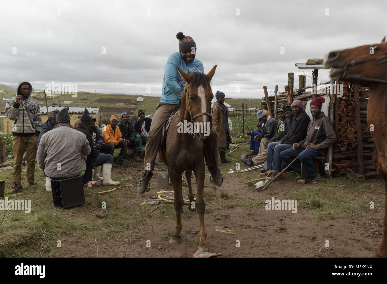 Matatiele, Eastern Cape, South Africa. 4th Dec, 2017. Xhosa men attend an initiation ceremony, sit together and drink a lot of beer. Credit: Stefan Kleinowitz/ZUMA Wire/Alamy Live News Stock Photo