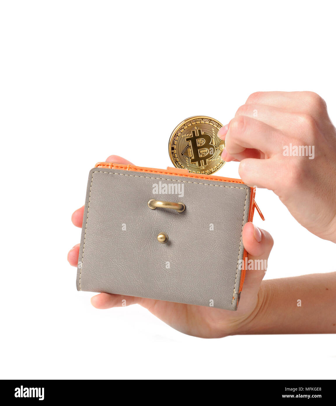 Hand putting coin in purse hi-res stock photography and images - Alamy