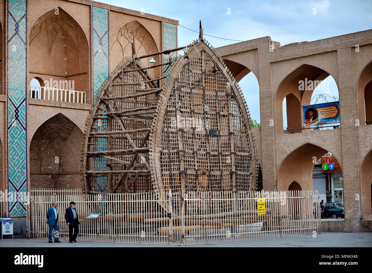 Nakhl Gardani, a wooden construction used during Ashura procession, for commemorating the death of third Shia Imam. Amir Chaqmaq Square - Yazd, Iran. Stock Photo