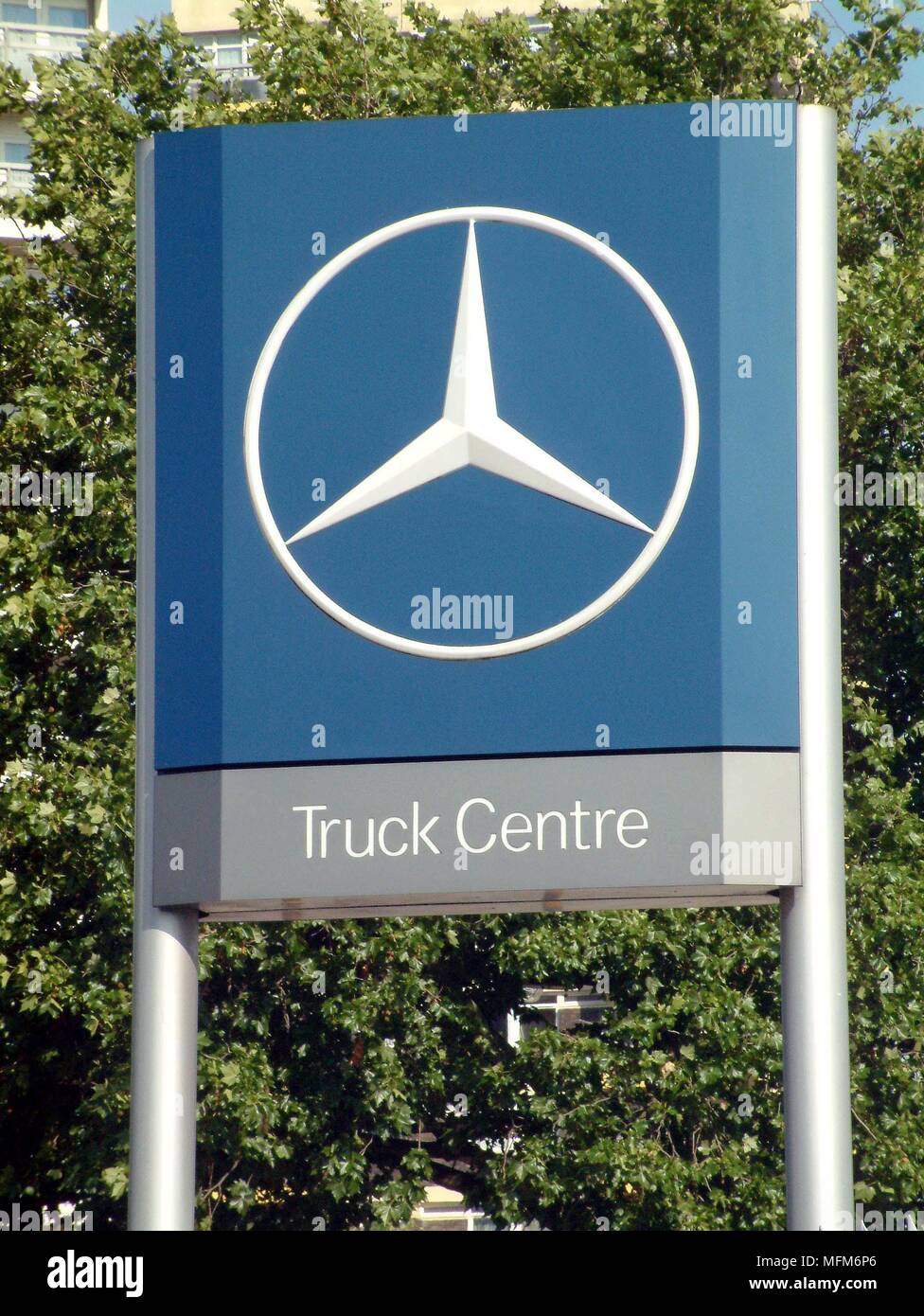 A Large Blue Road Side Mercedes Benz Logo Dealership Sign Shot Against A Clear Blue Sky The Company Specialises In Truck Sales Bandphoto Compu Stock Photo Alamy