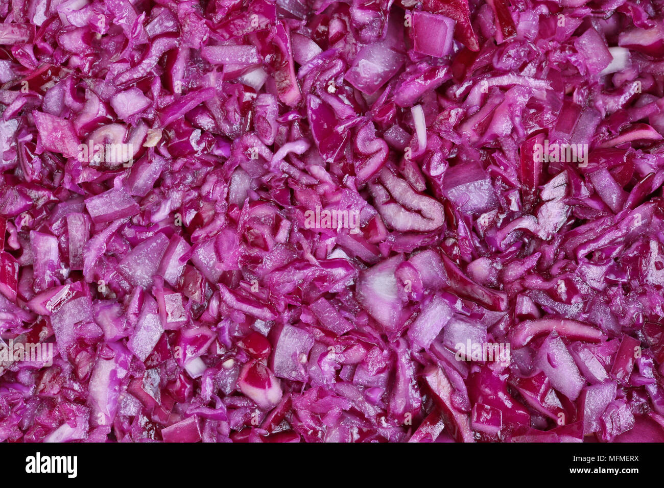 Finely chopped red cabbage vegetable background. Studio macro shot Stock Photo