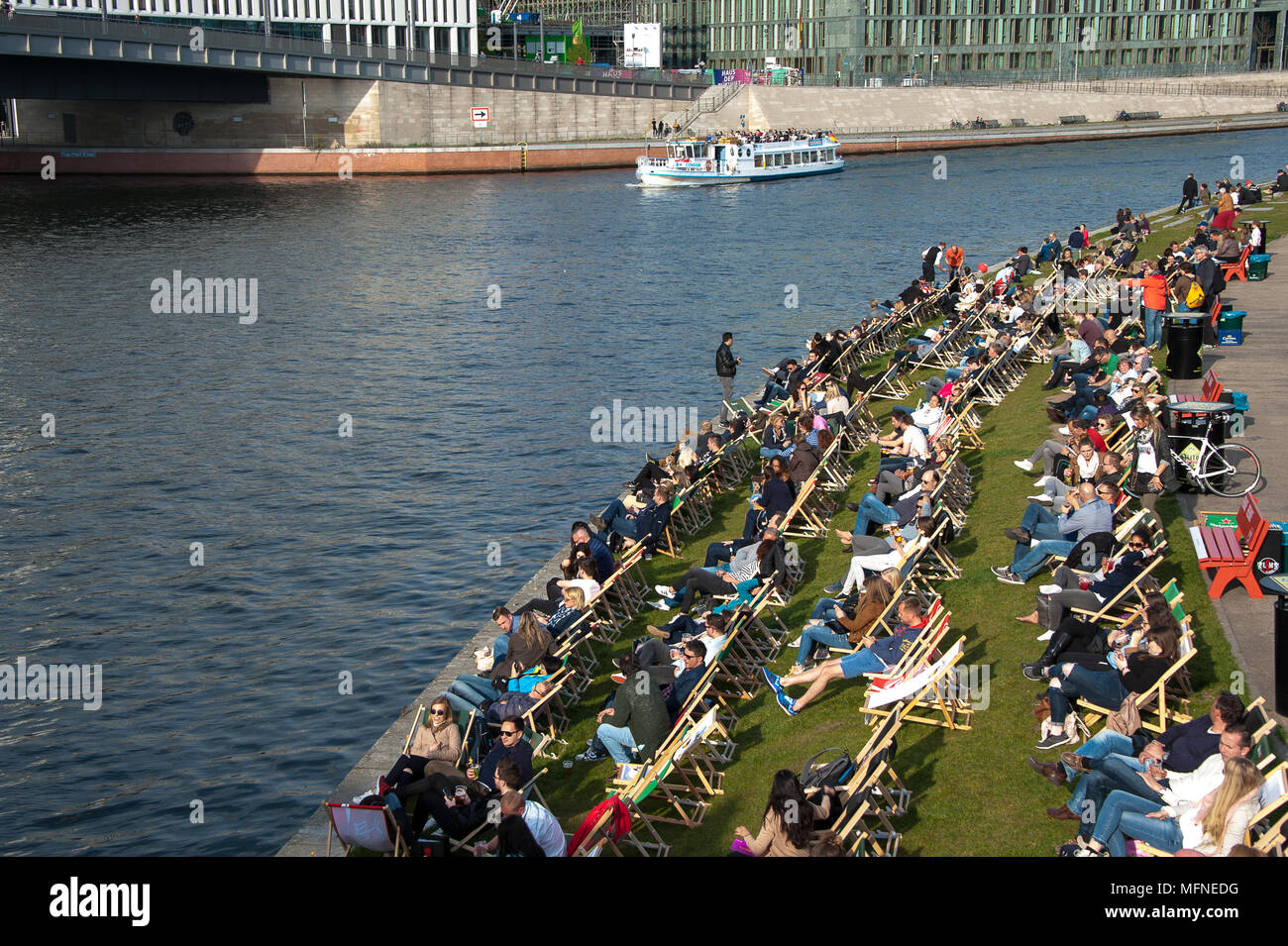 Berlin, Germany A typical warm weather pastime people relax in deckchairs, along the banks of