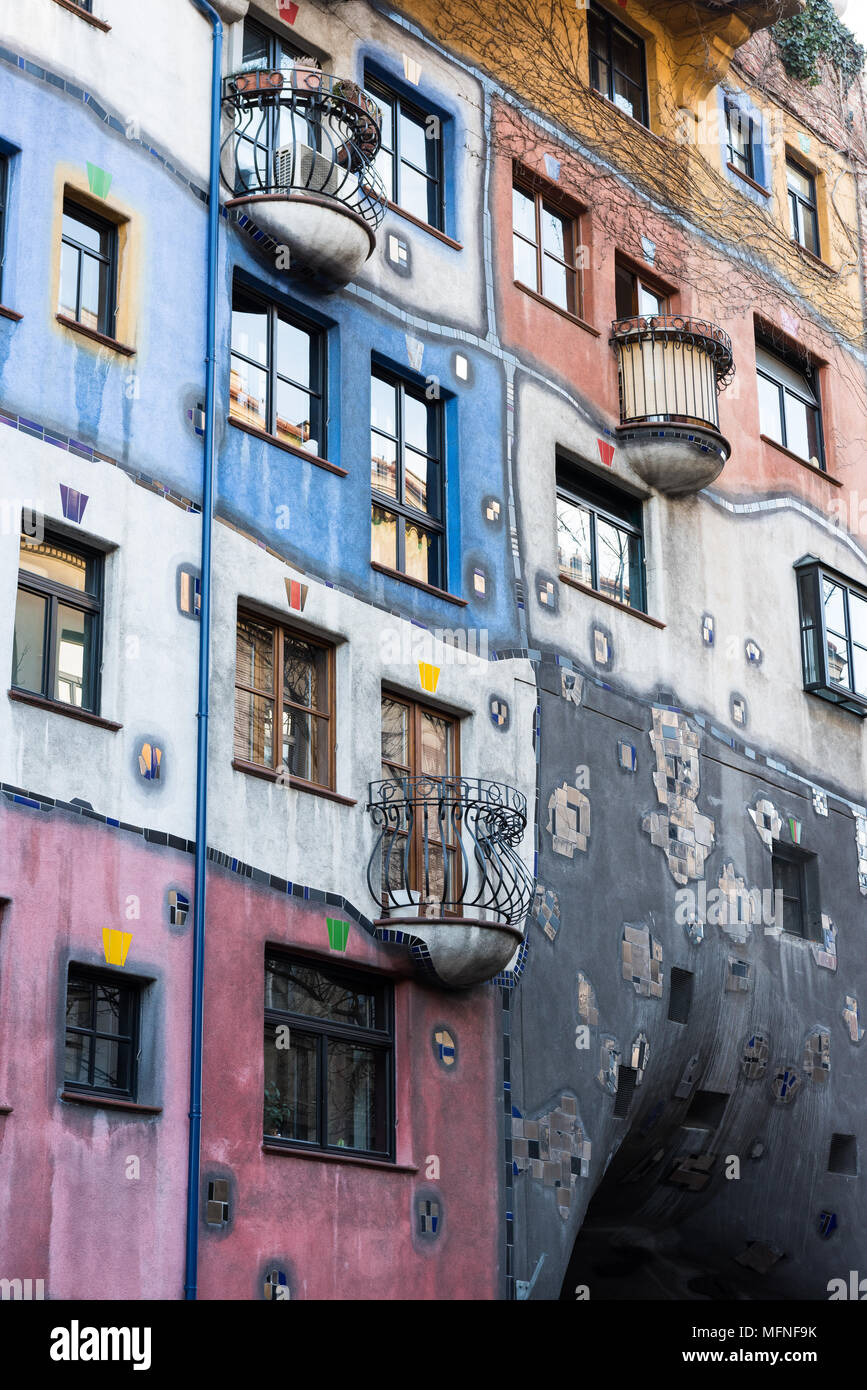 Facade of The Hundertwasserhaus public housing apartment building with undulating floors designed by Austrian architect Friedenreich Hundertwasser Stock Photo