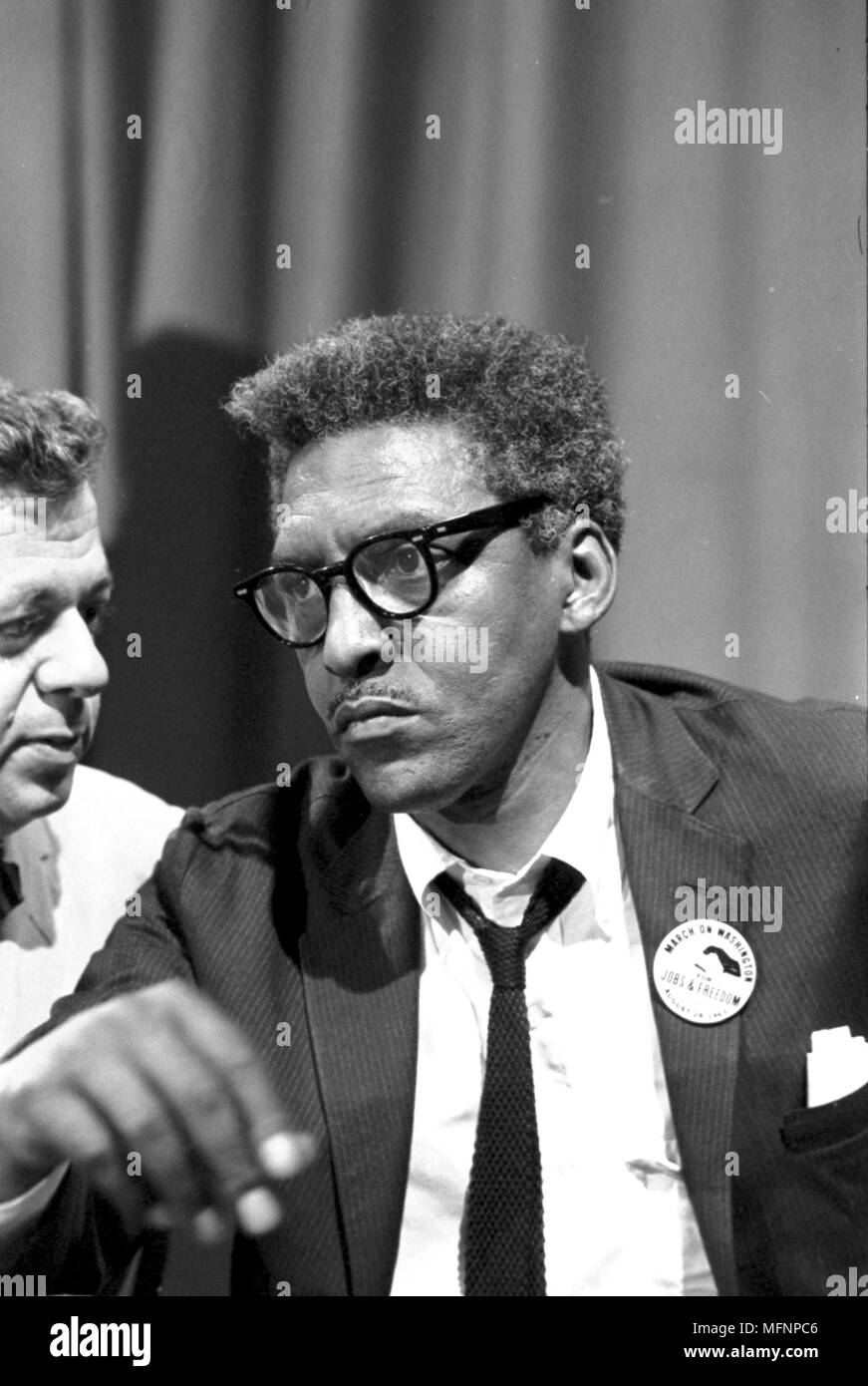 Bayard Rustin (1912-1987), American civil rights activist. Rustin in the Statler Hotel at a news briefing on the Civil Rights March on Washington, DC, USA, 27 August 1963. Photographer: Warren K  Leffler. Stock Photo