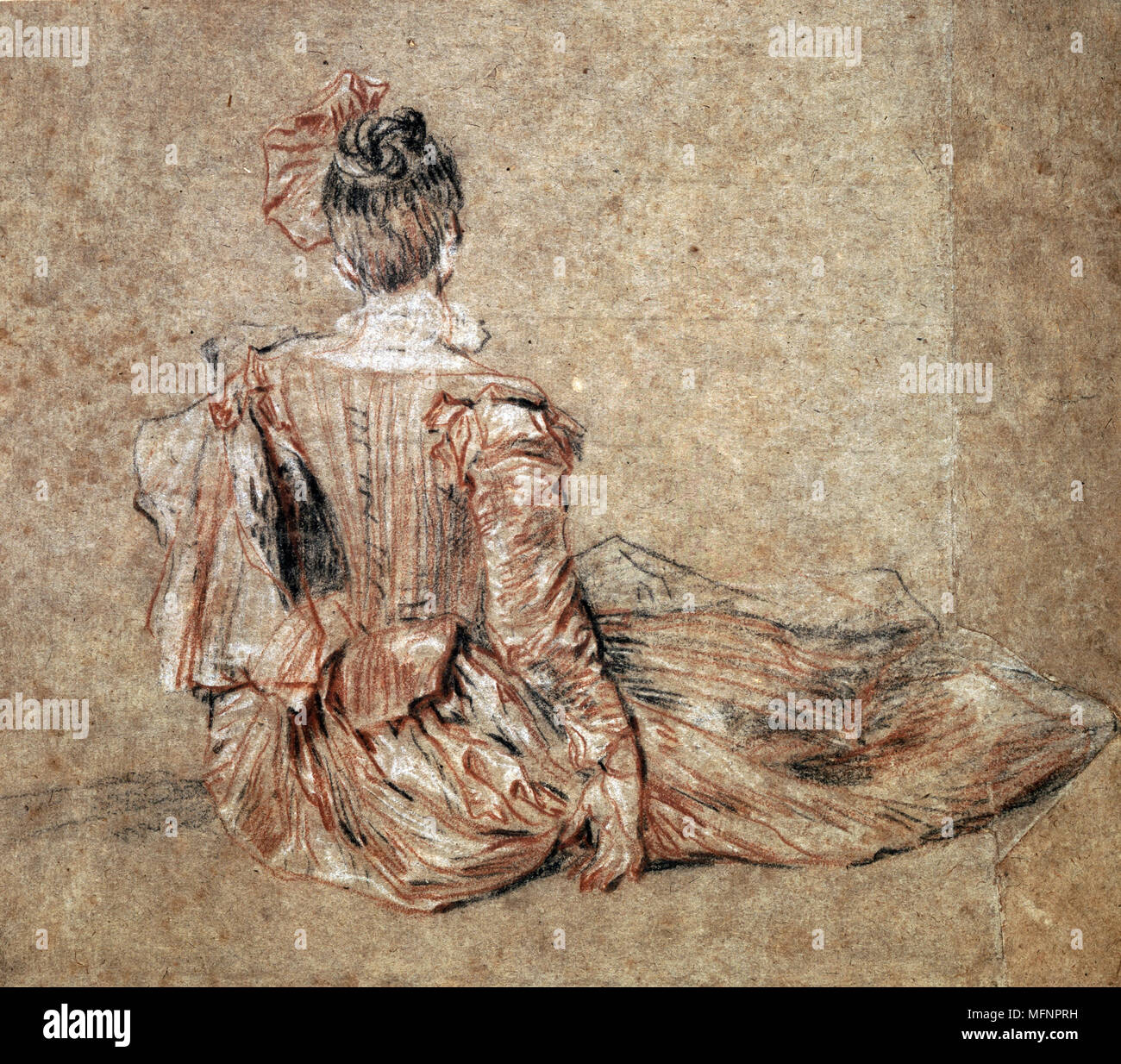 Seated woman viewed from the back . Drawing in black and red chalk.   Jean-Antoine Watteau (1684-1721) French Rococo painter Stock Photo