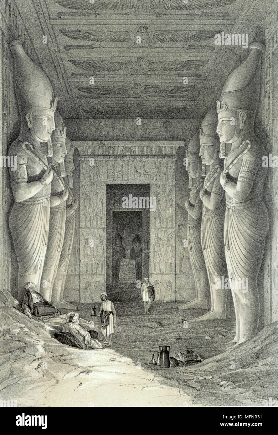 Limestone statues of Ramses II in main temple at Abu Simbel.  Each holds crook and flail, symbols of kingship.   Lithograph after Jules Goury (1803-1834) French Architect. Archaeology Religion Mythology Ancient Egyptian Stock Photo