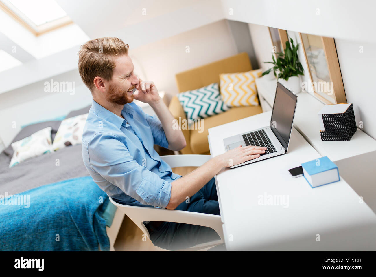 Self employed businessman working from home Stock Photo