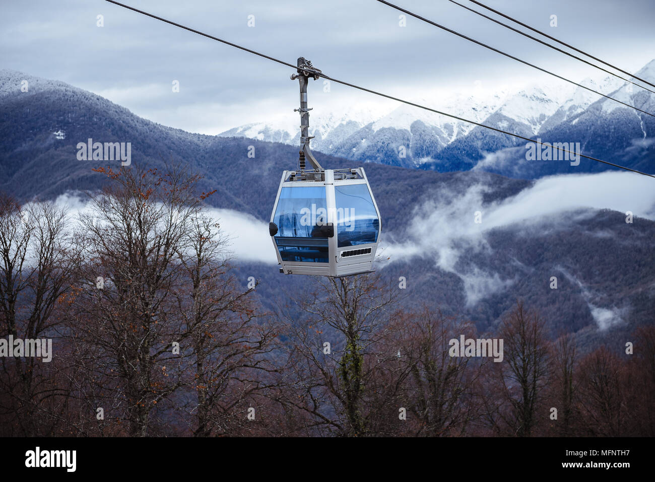 mountain ski slope on a sunny day. Winter mountain landscape Stock ...