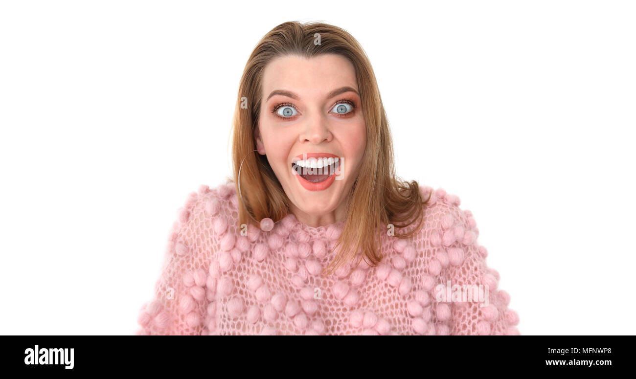Portrait young surprised and shocked woman in pink Stock Photo