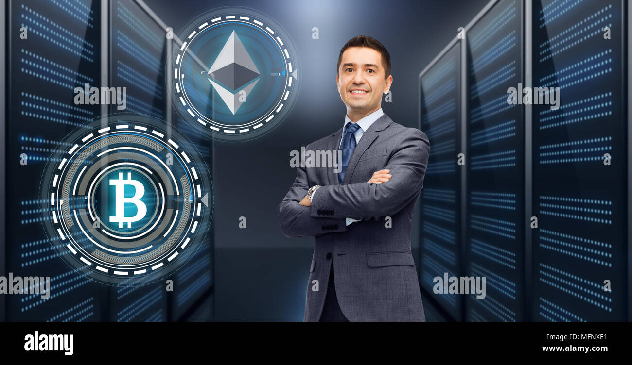 businessman with cryptocurrency holograms Stock Photo