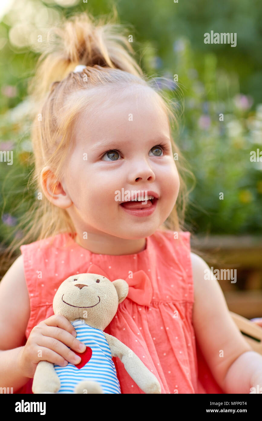 portrait of happy beautiful little girl outdoors Stock Photo - Alamy