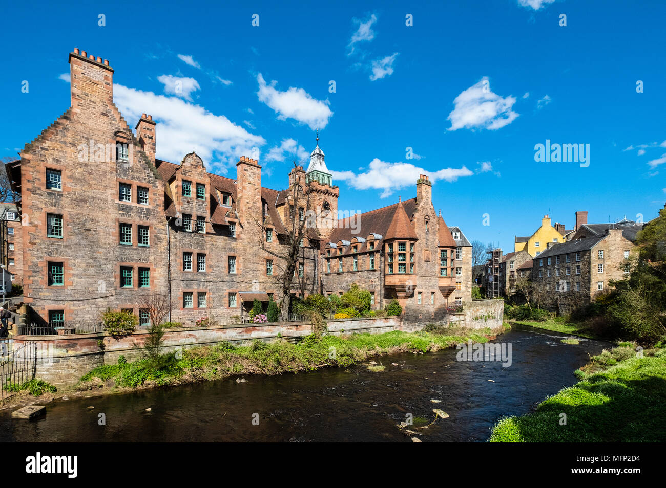 View of Water of Leith river at Dean Village with historic Wells Court building , Edinburgh, Scotland, UK Stock Photo