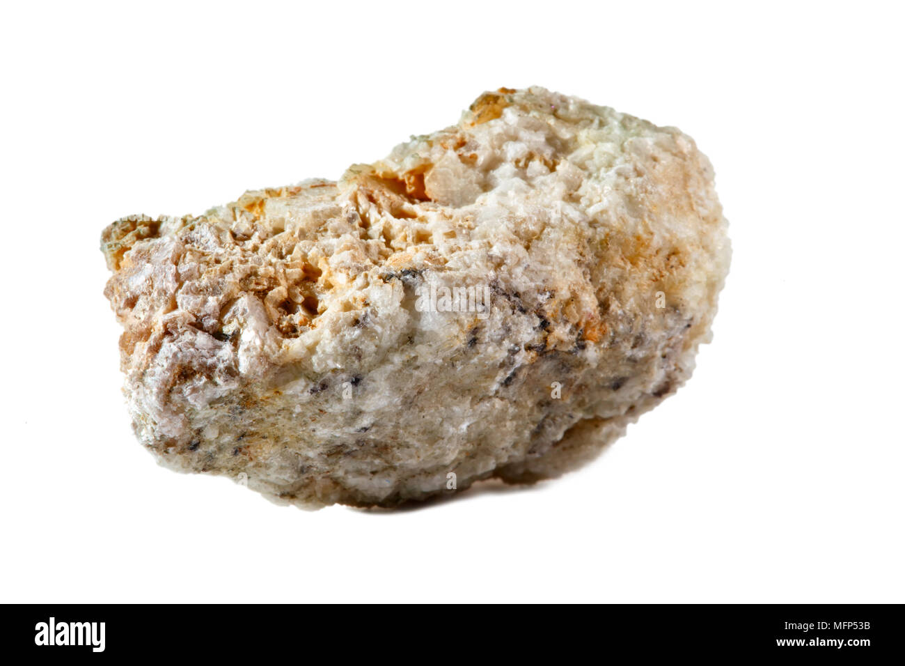 Macro shooting of natural gemstone. The raw mineral is albite, Brazil. Isolated object on a white background. Stock Photo